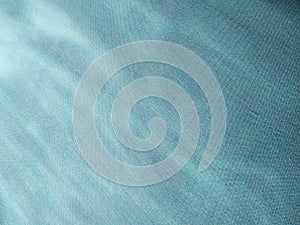 Background of dyed fabric. Beautiful abstract background. Sky, sea, blue background