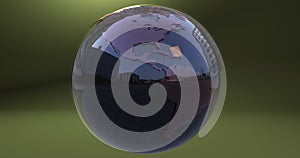 A background with the Earth planet made with a reflective material, which shows the American continent.