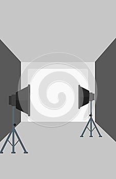 Background of empty photo studio with lighting equipment.