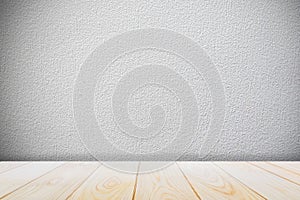 Background with empty wooden deck table over grunge cement wall, vintage, background, template,