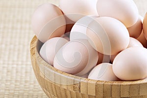 A background of farm fresh brown eggs