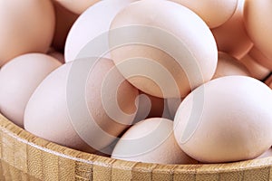 A background of farm fresh brown eggs
