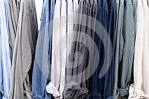Background of fashion shirts hanging on a hanger