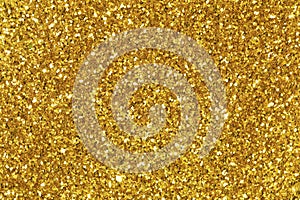 Background filled with shiny gold glitter.