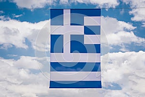 Background from the flag of Greece, developing against the sky and clouds