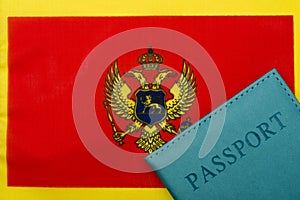 On the background of the flag of Montenegro is a passport