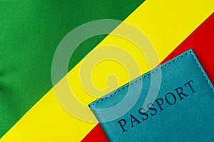 On the background of the flag of the Republic of Congo is a passport