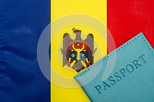 On the background of the flag of the Republic of Moldova is a passport