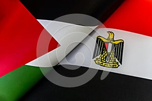 Background of the flags of the Egypt, palestine. The concept of interaction or counteraction between two countries. International