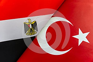 Background of the flags of the Egypt, Turkey. The concept of interaction or counteraction between two countries. International