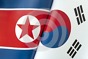 Background of the flags of the north korea and south korea. concept of interaction or counteraction between the two