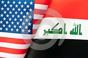 Background of the flags of the USA, iraq. concept of interaction or counteraction between the two countries. International