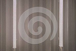 Background in the form of a curved grid with lamps