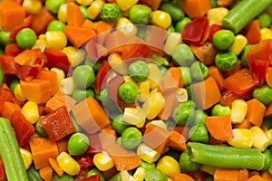 Background of fresh defrosted vegetables