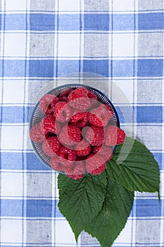 Background of fresh, sweet and ripe raspberries. summer berries