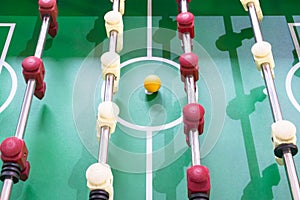 Background of the game of table football, close-up from above