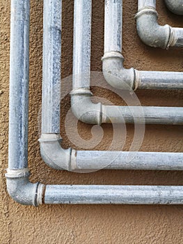 Background with gas pipes on the wall