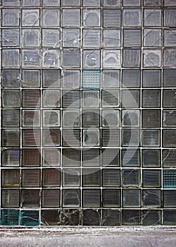 background of glass square tile wall with broken pieces