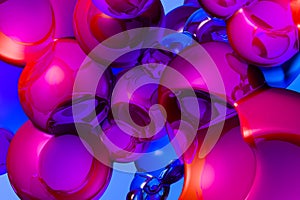 Background With Glossy Pink, Violet, Blue, Red Bubbles. 3D Rendering.