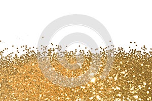 Background with gold glitter sparkle on white, decorative spangles