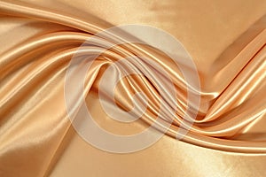 Background from golden satin fabric