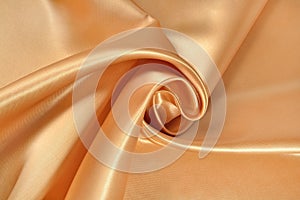 Background from golden satin fabric