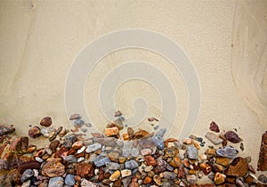 background of gravel and sand space for text here.beach sand and sea stones. photo