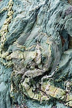 Background with green mineral rock close up, gemstone texture, olivine, amazonite, amphibolite