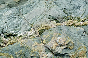 Background with green mineral rock close up, gemstone texture, olivine, amazonite, amphibolite