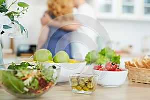 Background of Green Salad Ingredients on Kitchen Table