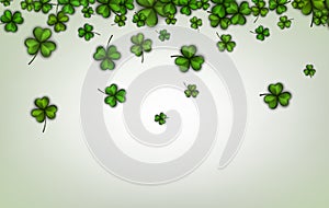 Background with green three-leaved shamrocks.