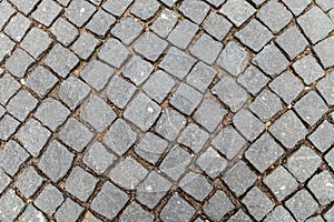 background of grey cobble stone pattern at the street