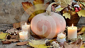 Background with halloween pumpkins, candles and autumn leaves on the wooden house porch