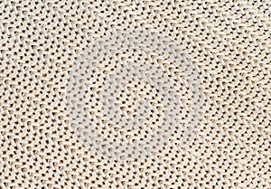 Background of Handmade Knitted fabric of cotton White Cream color, cloth knitted texture