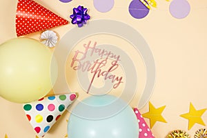 Background for happy birthday celebration or party. Group of colored balloons, confetti, candles, ribbons