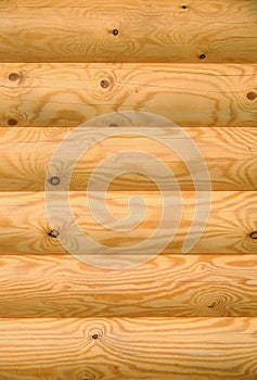 Background of horizontal hewed painted wooden logs