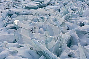 Background of icy snow hummocks, winter, Baikal