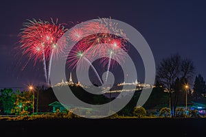 Background image. The annual event has fireworks. Take a picture in the dark.