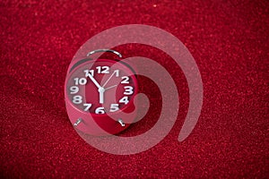 background image and beautiful red alarm clock Concept, time, date