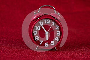 background image and beautiful red alarm clock Concept, time, date