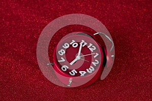 Background image and beautiful red alarm clock Concept, time, date