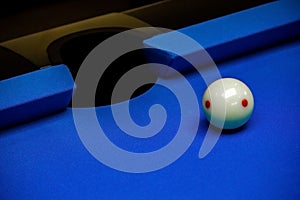 Background image of Billiard balls in a blue pool table