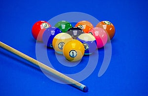 Background image of Billiard balls in a blue pool table