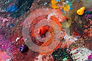 Background image of bright oil-paint palette