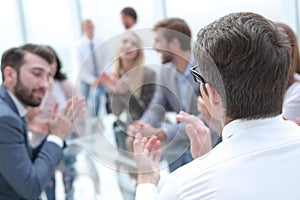 Background image business people applauding in the conference room