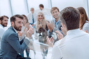 background image business people applauding in the conference room