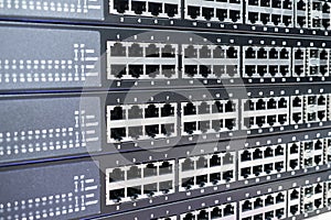 Background image of empty Ethernet switch ports. Server equipment for telecommunications. The concept of connecting to modern