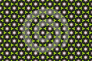 The background image has many geometric patterns and is black, pink, green