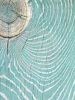 background image of an old cracked wooden surface with shabby blue marine paint