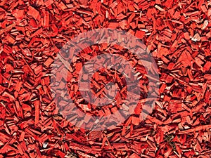 Background image of a pattern of red small pieces of wood